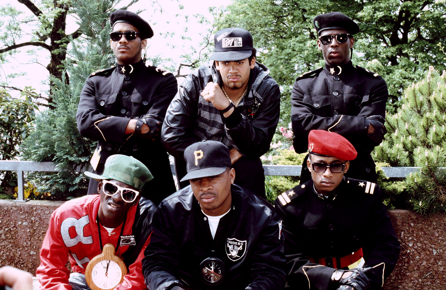SWITZERLAND - JANUARY 01: MONTREUX ROCK FESTIVAL Photo of PUBLIC ENEMY, front L-R Flavor Flav, Chuck D, Professor Griff (Photo by Suzie Gibbons/Redferns)